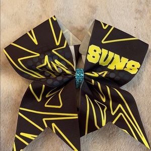 A cheerleading bow🎀